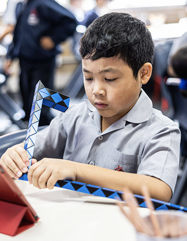 Sacred Heart Catholic Primary School Westmead student learning with building blocks