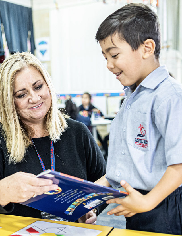 Dedicated principal Natalie Mifsud and student from Sacred Heart Catholic Primary School Westmead