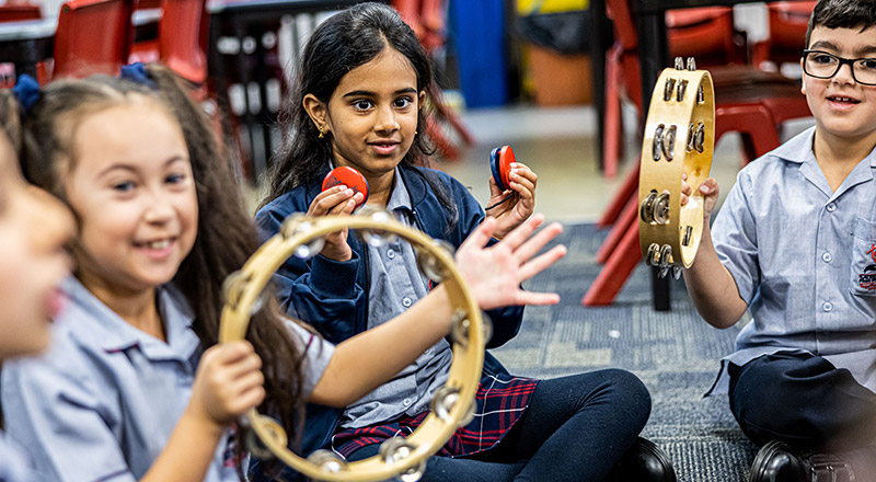 Sacred Heart Catholic Primary School Westmead students learning percussion instruments