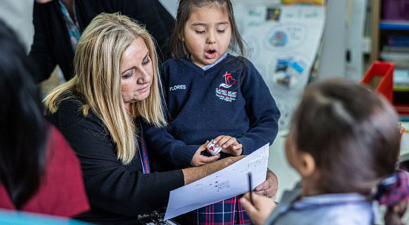 Dedicated principal Natalie Mifsud and student from Sacred Heart Catholic Primary School Westmead