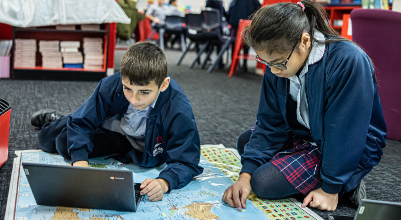 Sacred Heart Catholic Primary School Westmead students learning on rug