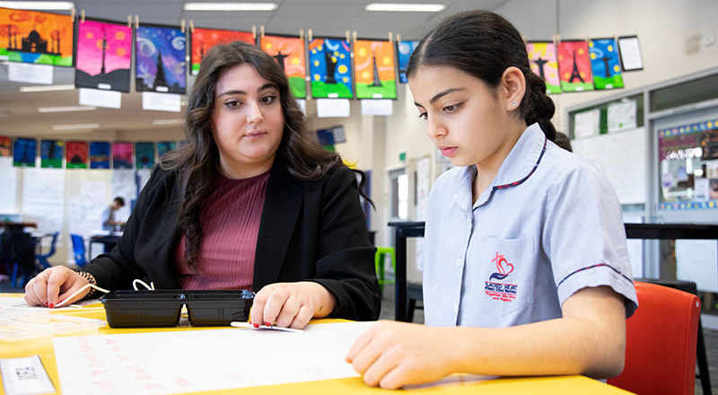 Sacred Heart Catholic Primary Westmead teacher supporting student in class