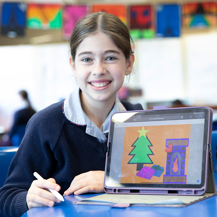 Sacred Heart Catholic Primary School Westmead student showing learning on iPad